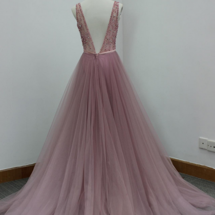 Pink Floor Length Tulle Formal Gown Featuring..