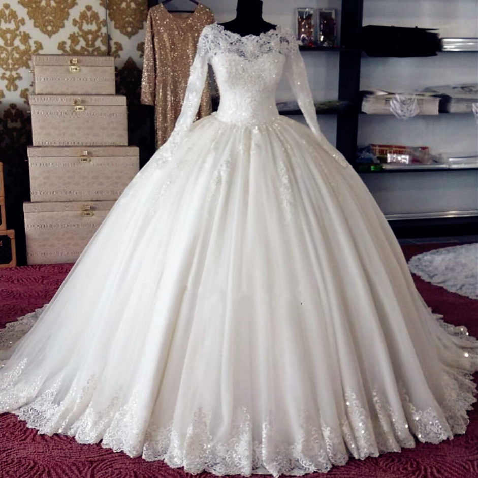 Sheer Lace Appliqués Ball Gown Wedding Dress With Long Sleeves And Long Train