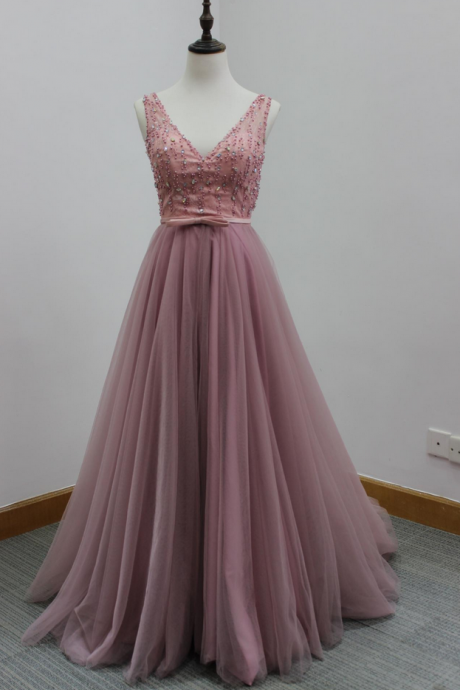Pink Floor Length Tulle Formal Gown Featuring Sleeveless Plunge V Bodice With Beaded Embellishment, Bow Accent Belt And Open Back