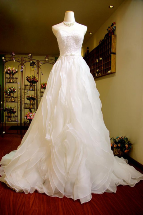 Sweetheart Organza A-line Wedding Dress Featuring Beaded Embellishment, Lace Up Back And A Chapel Train
